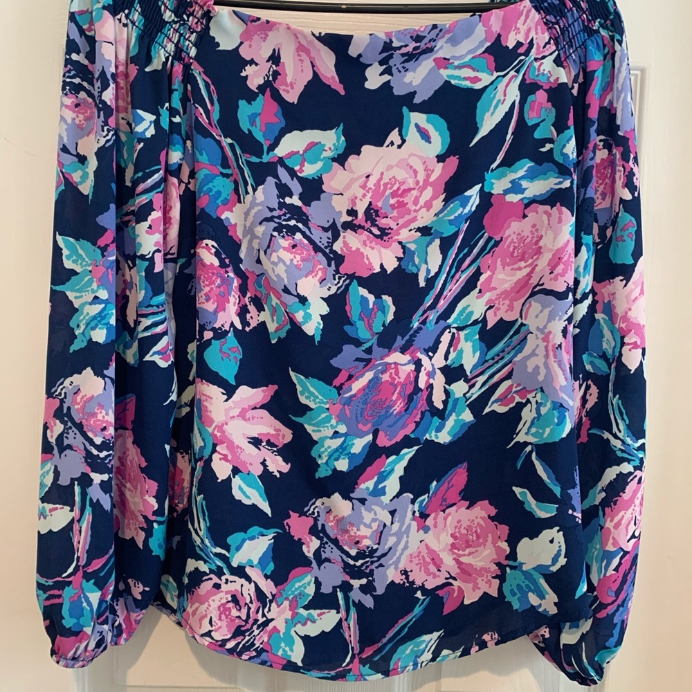 Off the shoulder.  Great summer top with white capris